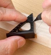 Using the protractor scale marked on a 35mm Pocket Layout Square to lay out an angled cut line