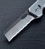 A close view of one of the included utility blades mounted in the blade carrier on the 3-in-1 knife
