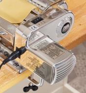 An electric motor connected to a pasta machine