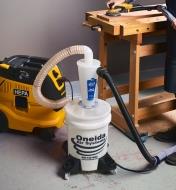 A Dust Deputy connected to a dust extractor and an orbital sander