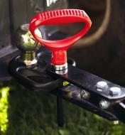 A magnetic hitch pin attaching a trailer using a three-way hitch plate