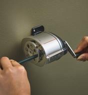 The X-Acto KS pencil sharpener mounted on a wall