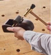 Adjusting the blade in a wooden plane using the Wile plane hammer