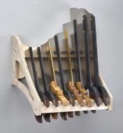 Eight backsaws, ranging from a small dovetail saw to a large tenon saw, stored in an eight-saw till