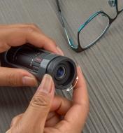 Adjusting the zoom monocular’s eyepiece to accommodate a pair of glasses