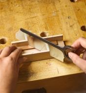 Using Veritas miniature rip tenon saw to cut a small piece of wood in a small shop-made miter box