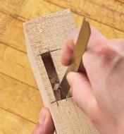 Scraping the walls of a right-angled mortise using the Narex uni-scraper