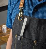 The Narex uni-scraper in an apron pocket