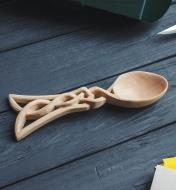 A completed carved lovespoon