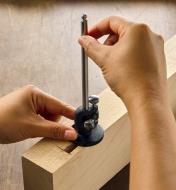 Using a replica micro-adjust wheel marking gauge to check the depth of a mortise