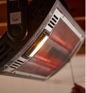Close-up of the built-in 25W halogen lamp on the Quartz Overhead Radiant Heater