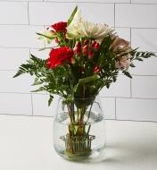 Porte-fleurs à tiges flexibles supportant un bouquet de fleurs dans un vase