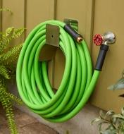 3/4" garden hose connected to an outdoor tap