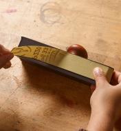 Attaching a sandpaper strip to a Veritas Shooting Sander