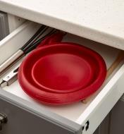 The silicone pot insert collapsed and sitting in a drawer