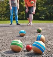 Two women playing Pétanque