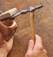 Using the cross-peen hammer to adjust a molding plane blade