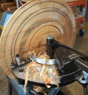 Making the first cut into a wooden bowl blank on a lathe using the Bowlsaver Max4 system