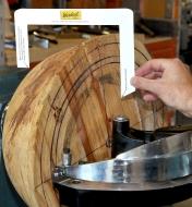 Using a template to lay out cuts before using the Bowlsaver Max4 to cut bowls from a wooden blank