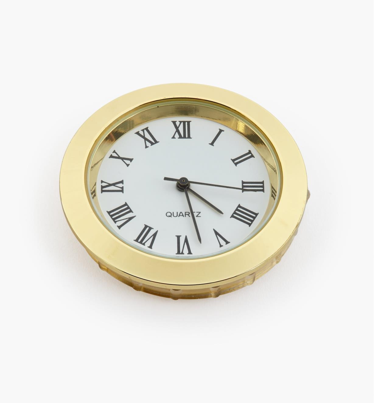 44K0151 - Horloge, cadran blanc à chiffres romains, lunette or
