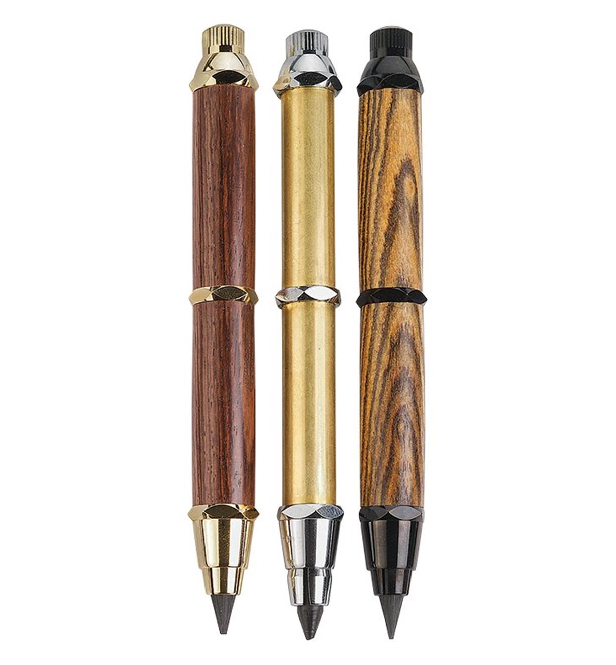 Examples of completed gold and black chrome Woodworker's Sketch Pencils with chrome hardware between them