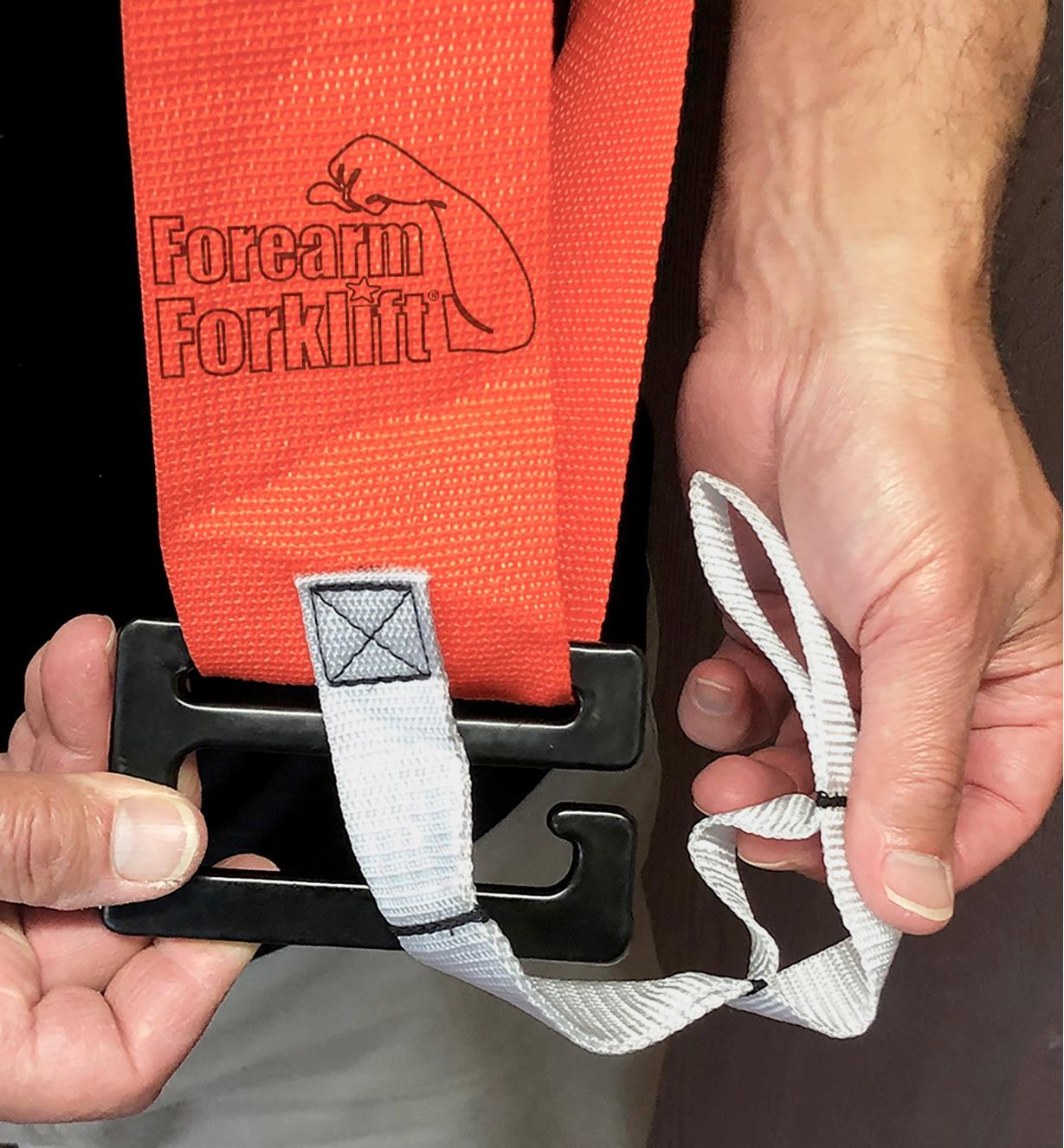 A close view of the adjustable tether used to secure a load to the Bucket Buddy Sash