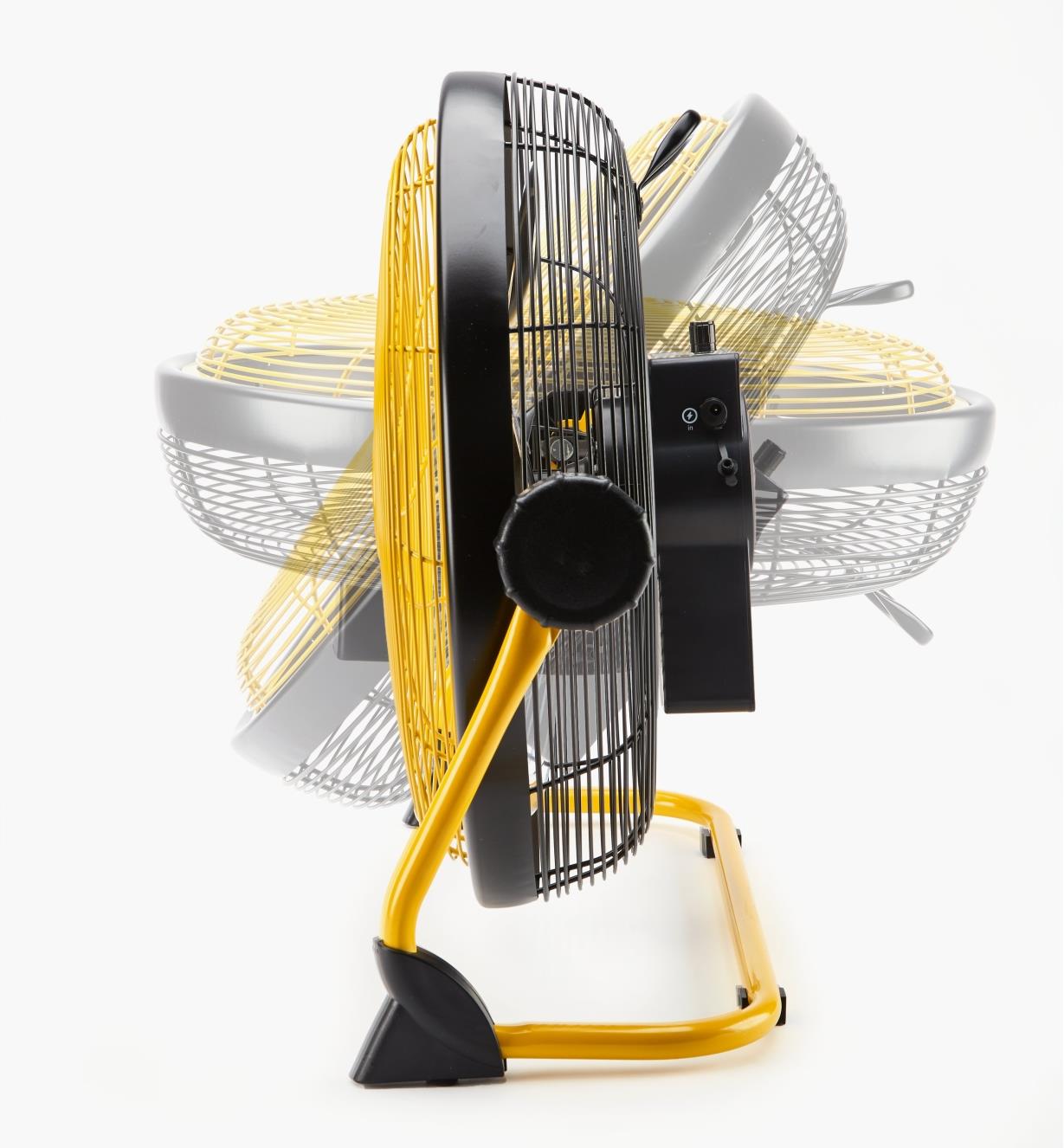 Side view of rechargeable high-velocity fan showing range of angle adjustment