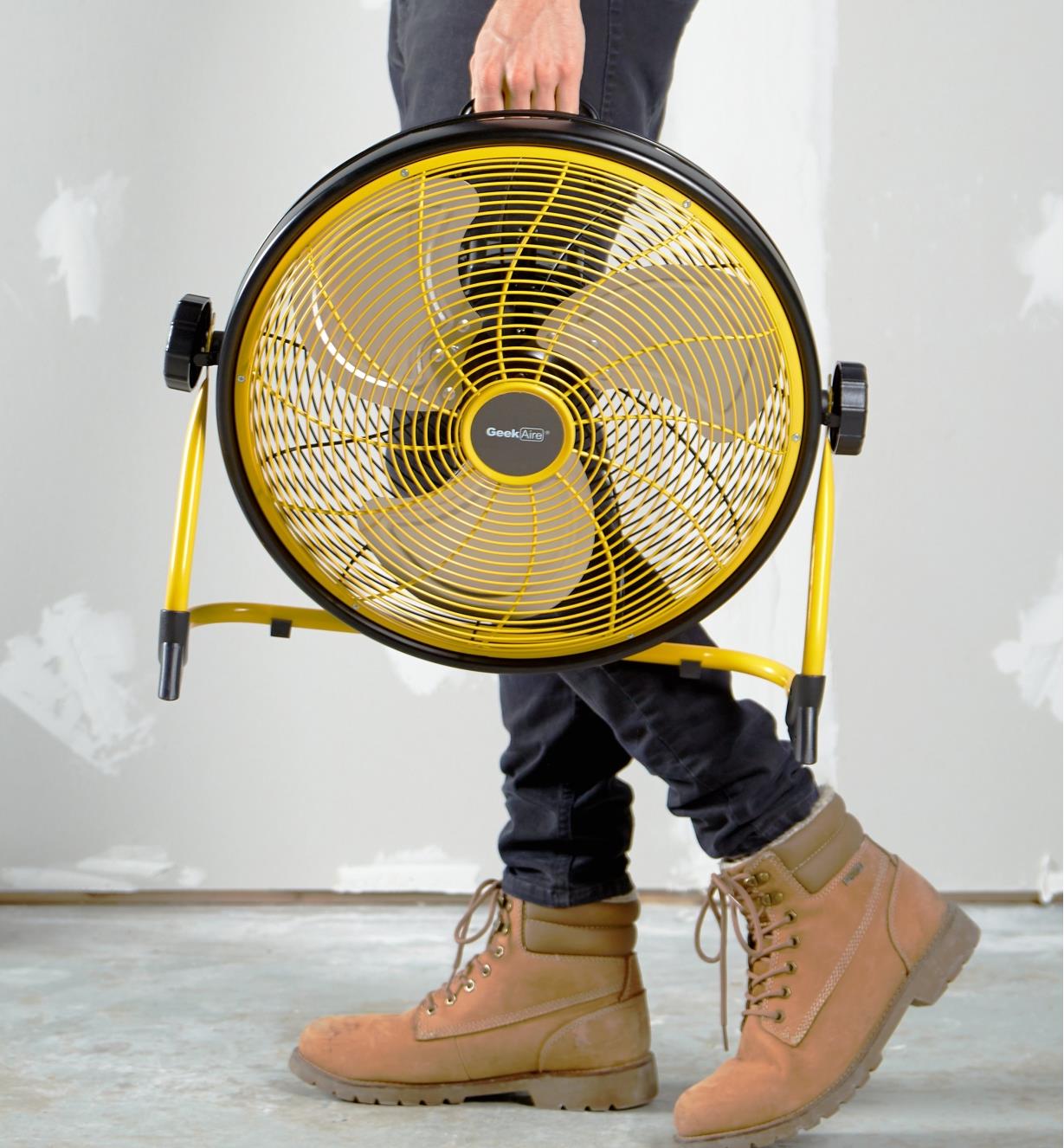 Carrying the rechargeable high-velocity fan with a built-in handle