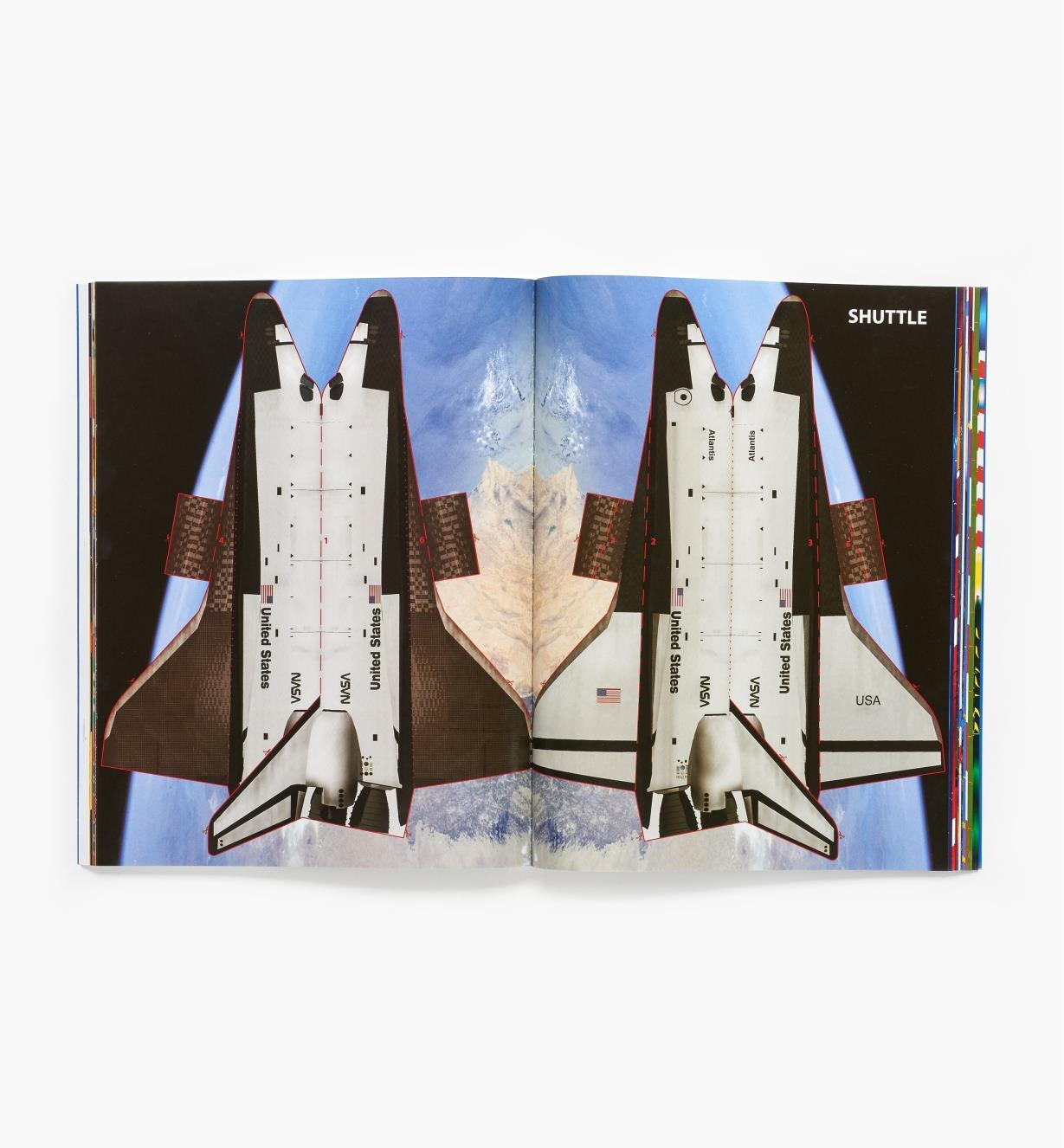 Open book showing a cut-out Space Shuttle