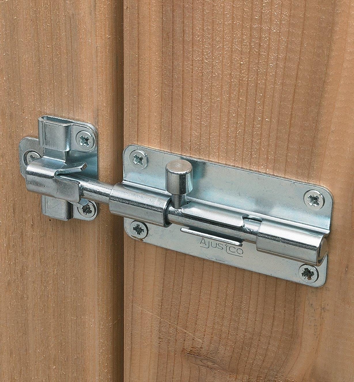 4" Self-Aligning Bolt mounted on a gate