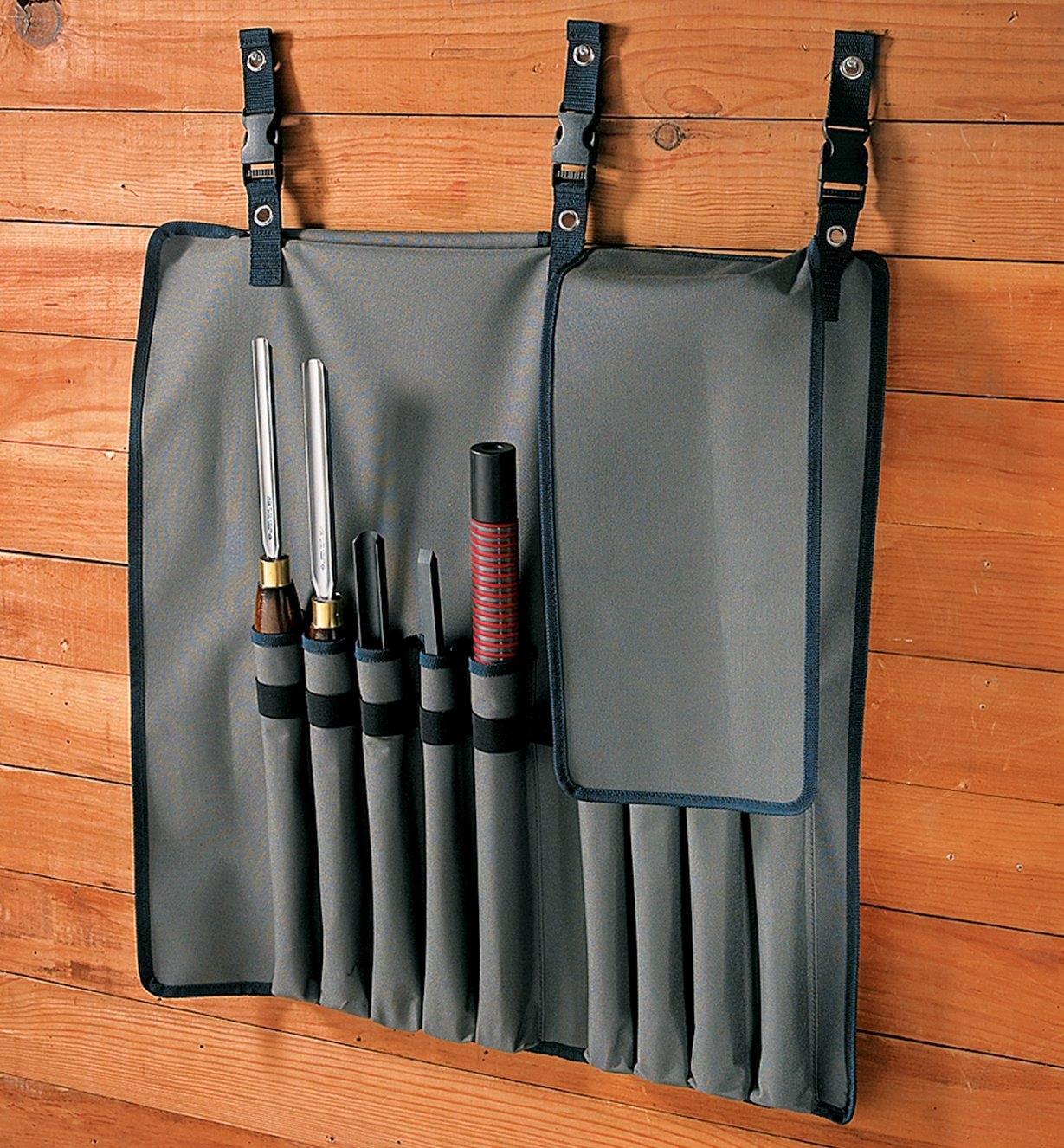 Lee Valley Turning Tool Roll hanging on a wall, holding tools