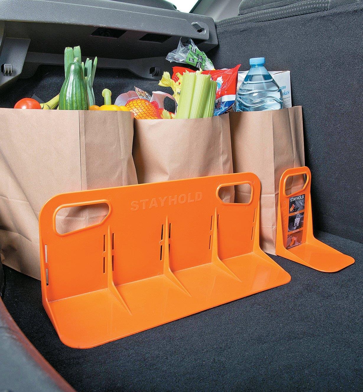 Modular Cargo Organizer supporting bags of groceries in a car trunk