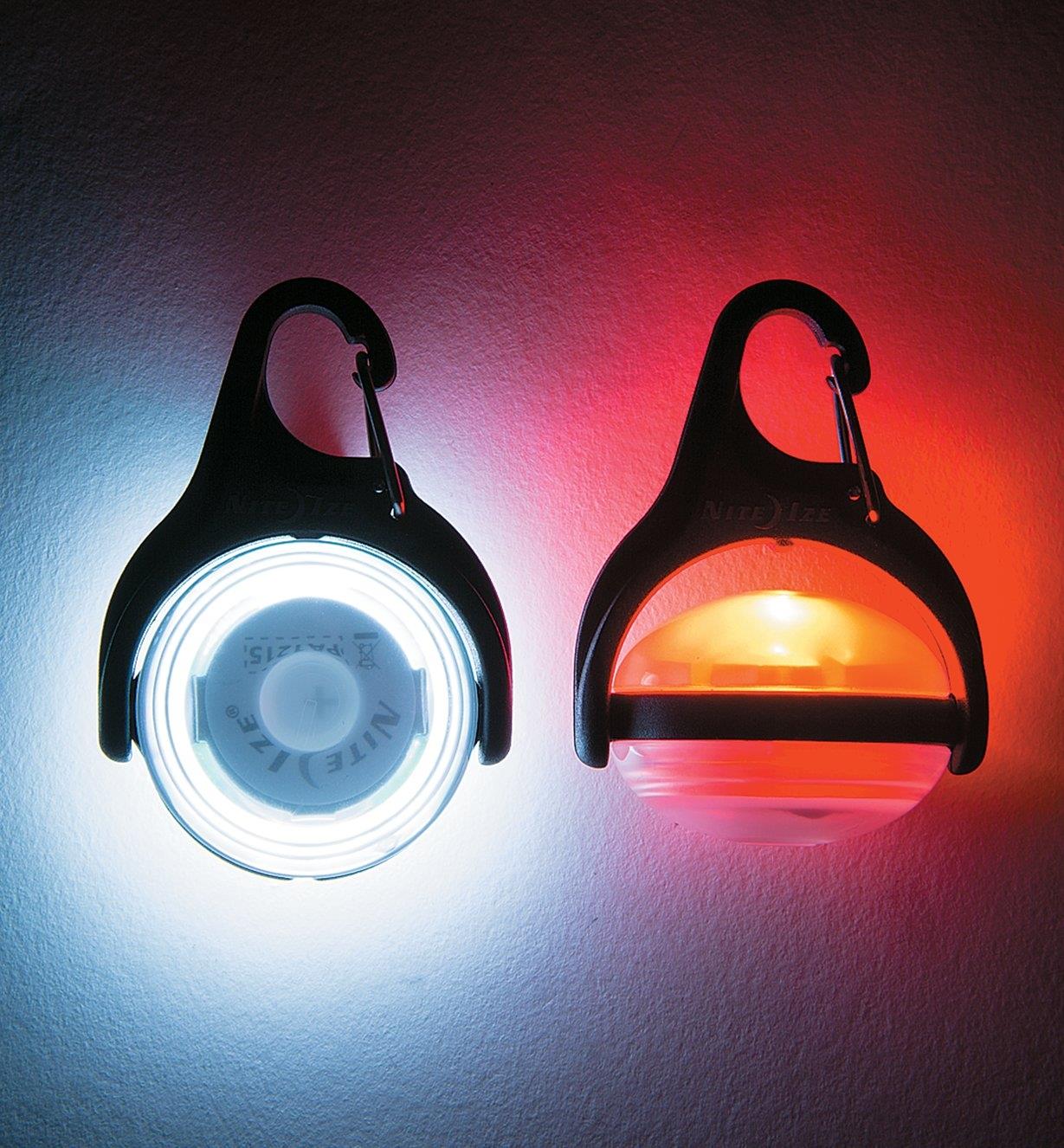 Two pivoting Carabiner LED Lights, shown in line with and at a right angle to the mount