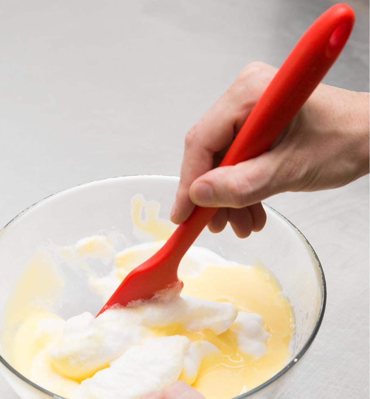 Mixing ingredients with a silicone spatula