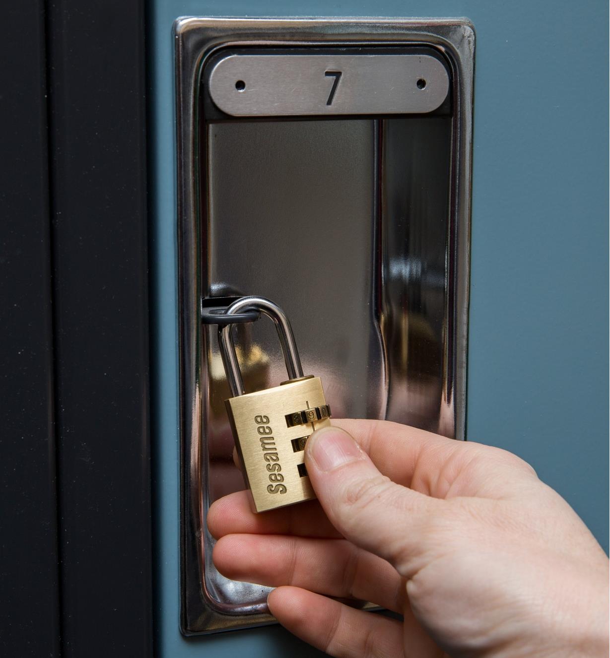 Locker door secured with a 2 9/16" x 1 3/16" padlock
