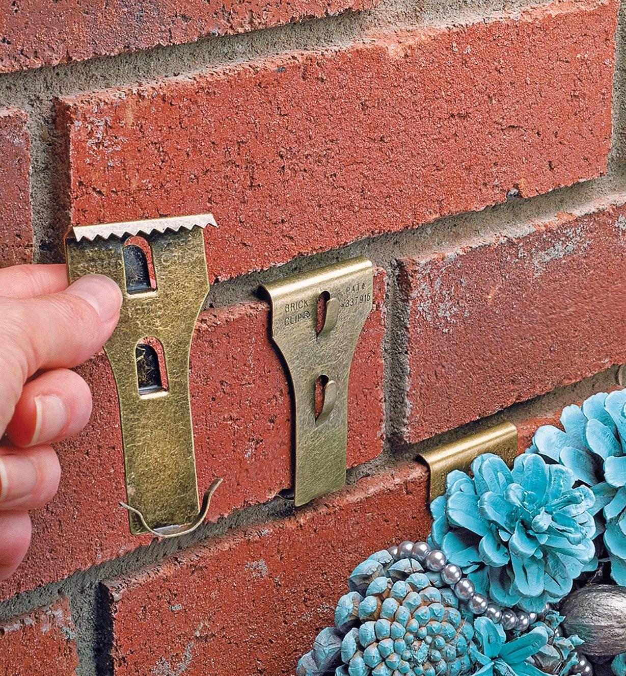 Brick Clip attached to a brick wall