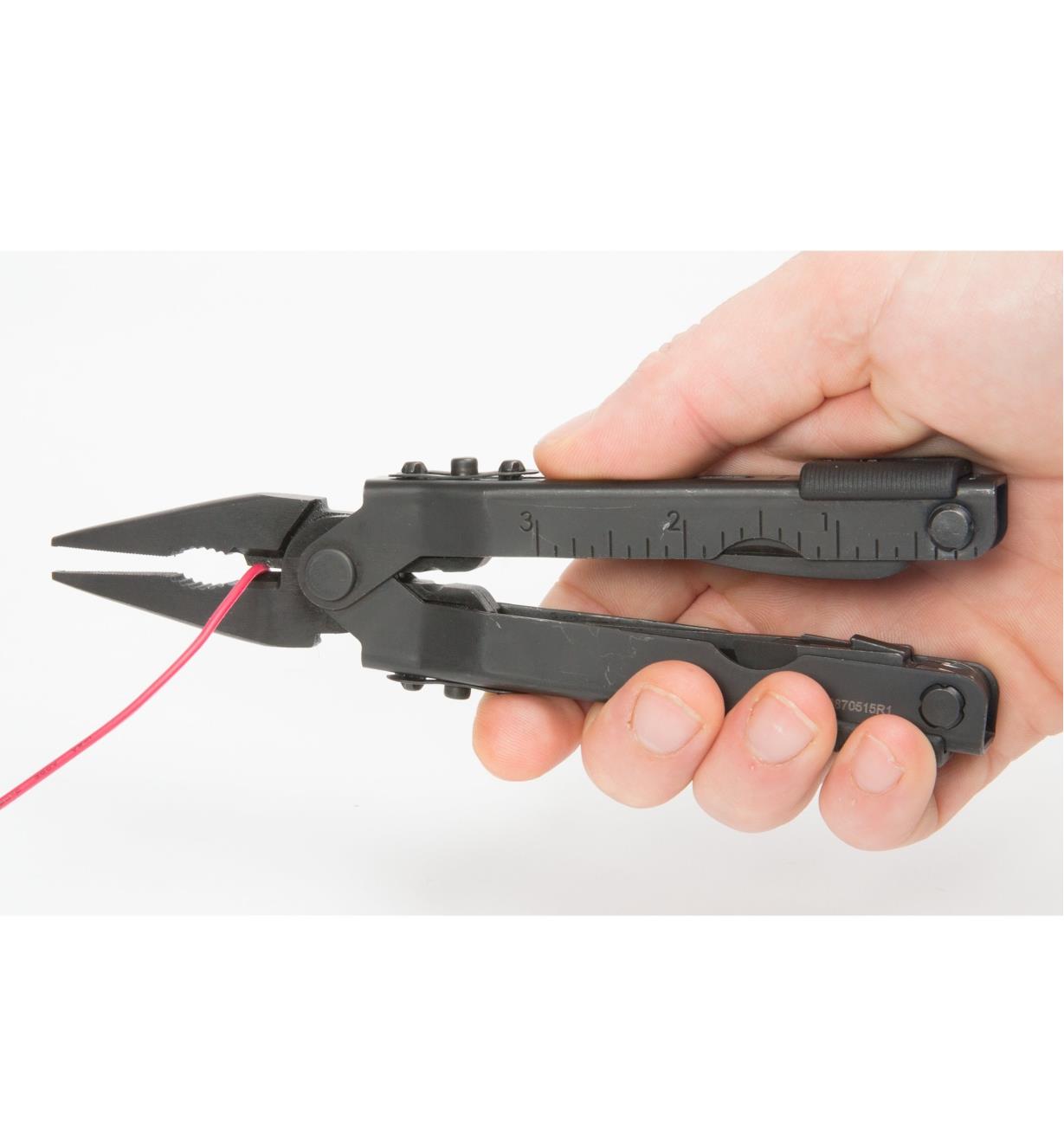 Canadian Army Multi-Tool cutting a wire