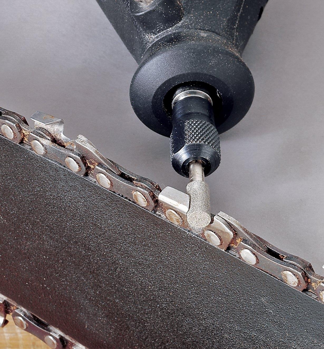 Using a chain-saw burr in a Dremel tool to sharpen chain-saw teeth