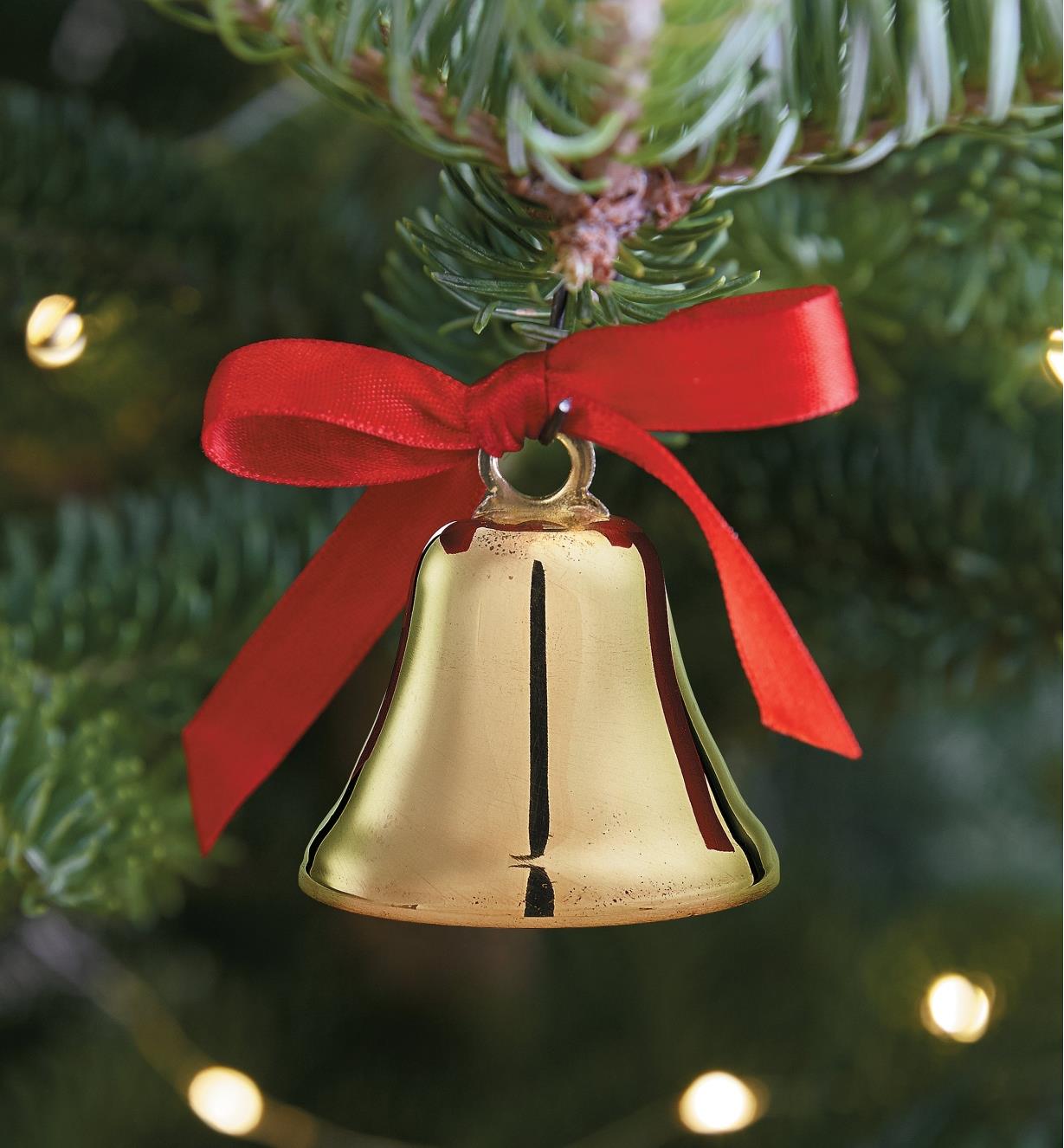 Brass Ornament Bell hanging on a Christmas tree