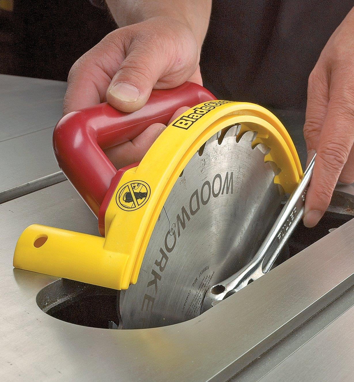 Using the Blade-Changing Tool to remove a table-saw blade