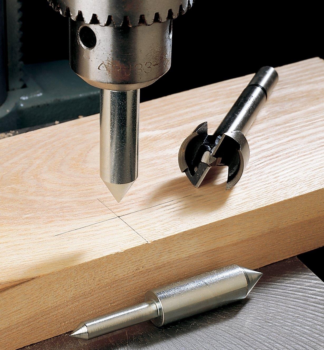 Center-Finding Pin chucked in a drill press for marking a point on a board