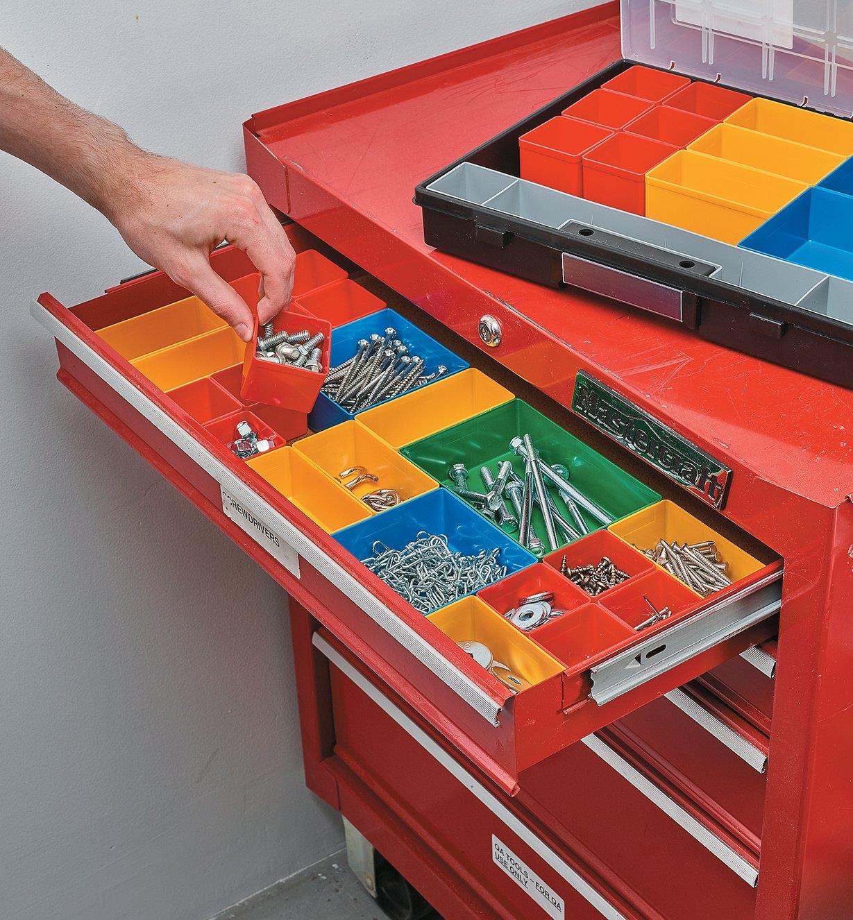 Allit Insert Bins arranged in a tool-chest drawer, holding various fasteners