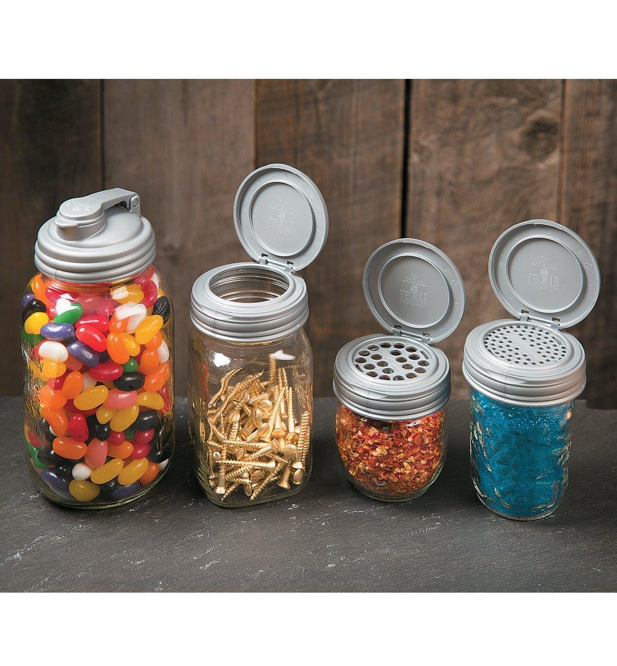 Canning Jar Caps on jars filled with jelly beans, screws, and spices