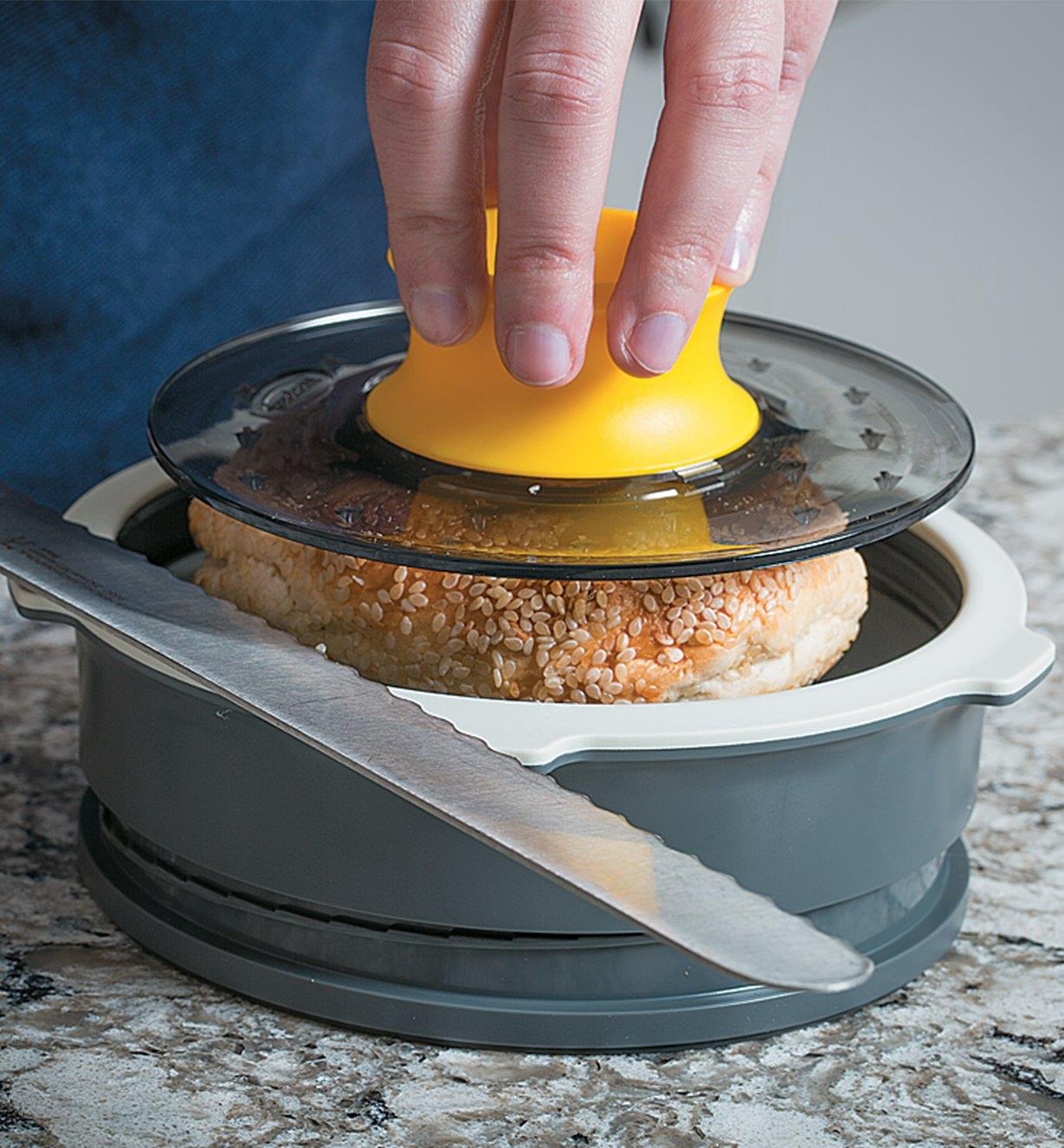 Slicing a bagel in the Bagel Slicing Guide