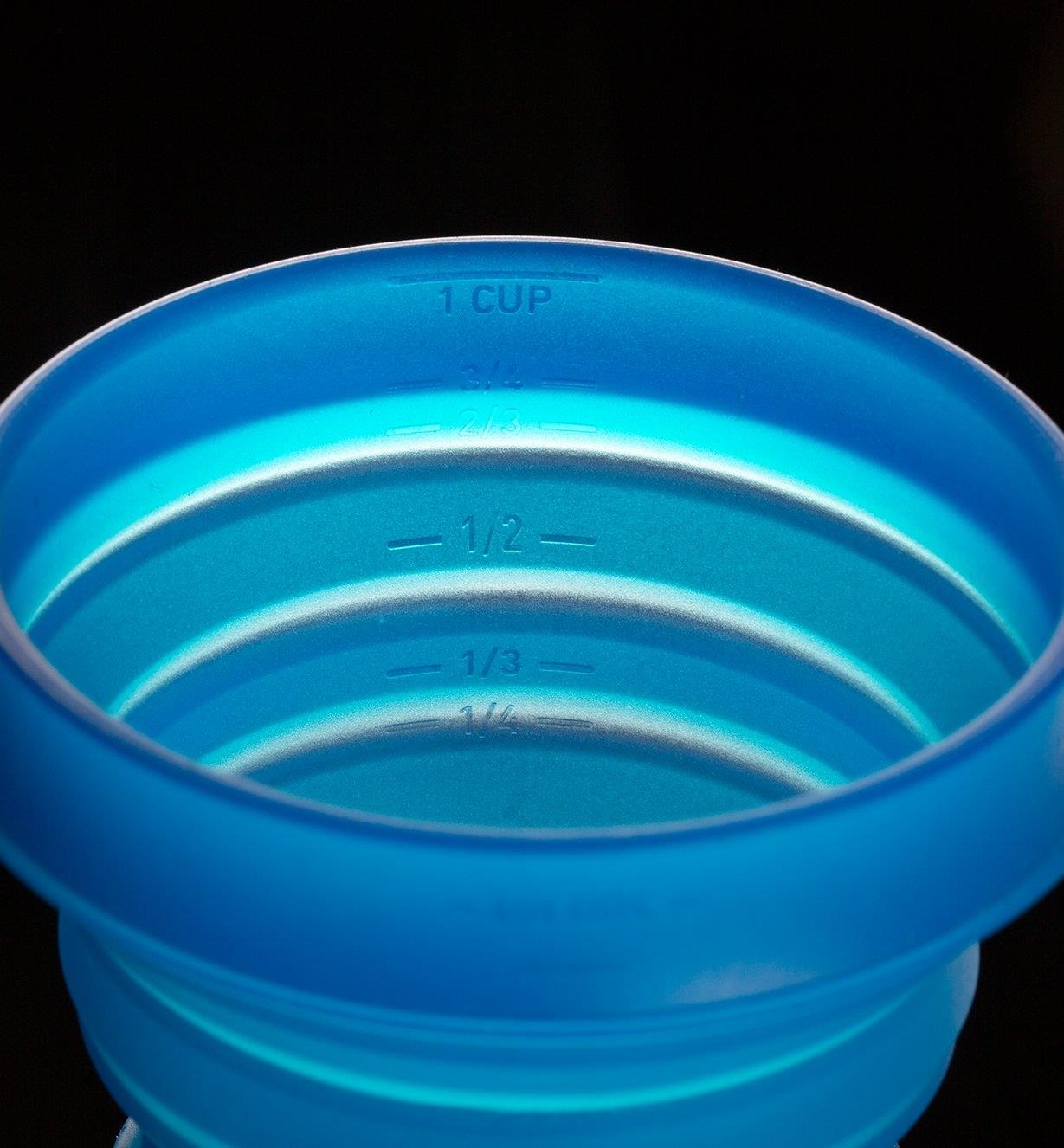 Close-up of Blue Collapsible Cup showing graduations