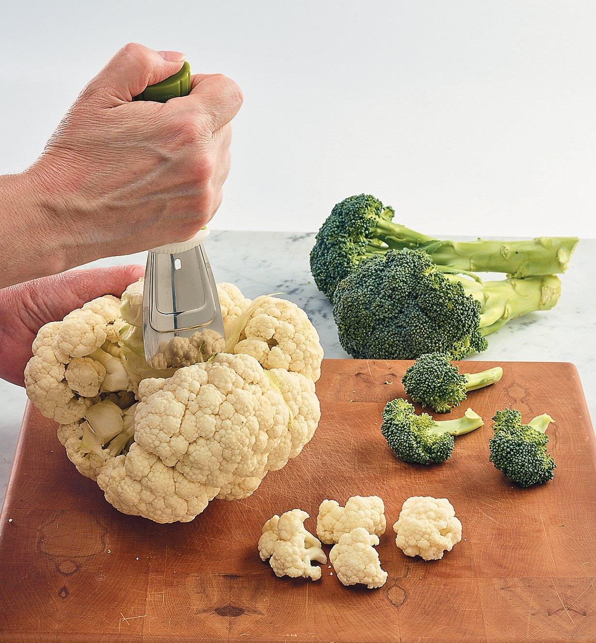 Coring a cauliflower with the Cauliflower & Broccoli Prep Tool