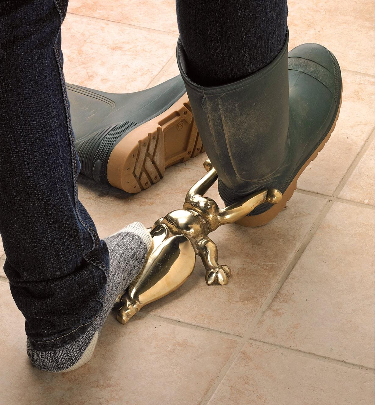 Using the Brass Beetle Bootjack to remove a boot