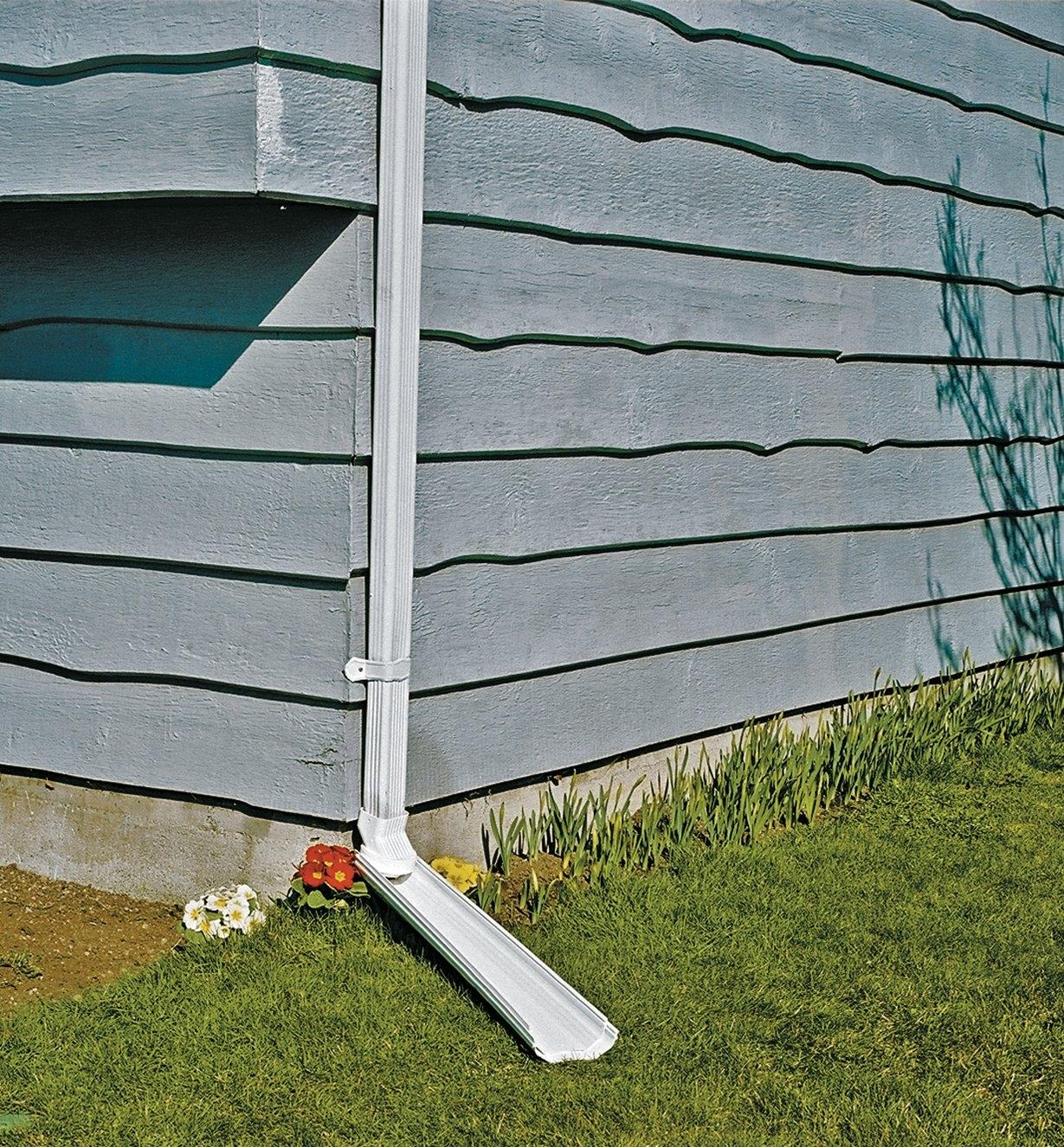 Adjustable Downspout attached to a downspout, in down position