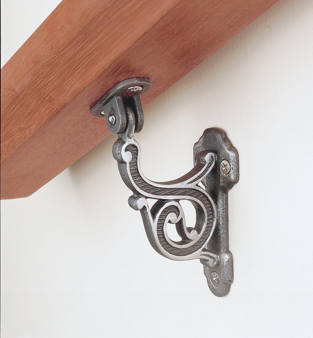 Scroll Handrail Bracket mounted to a handrail