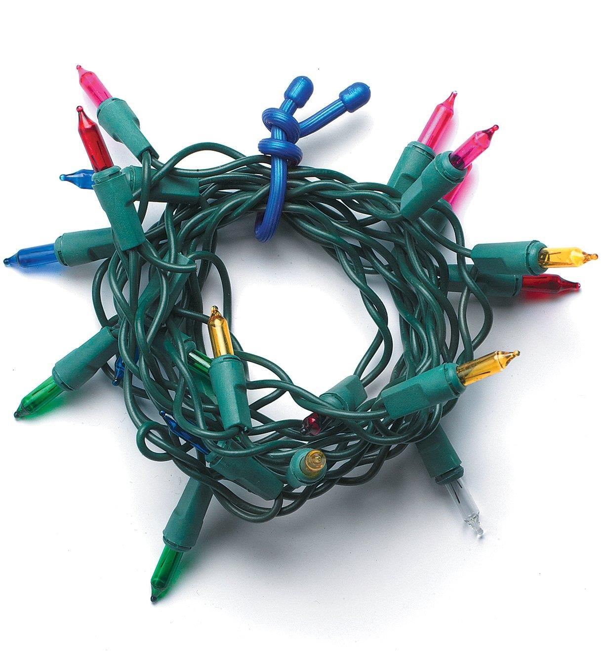 Gear Tie securing a bundle of Christmas lights